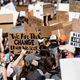 Protestors march along H Street NW near the White House during continued demonstrations over the death of George Floyd while in police custody on June 7, 2020 in Washington, D.C